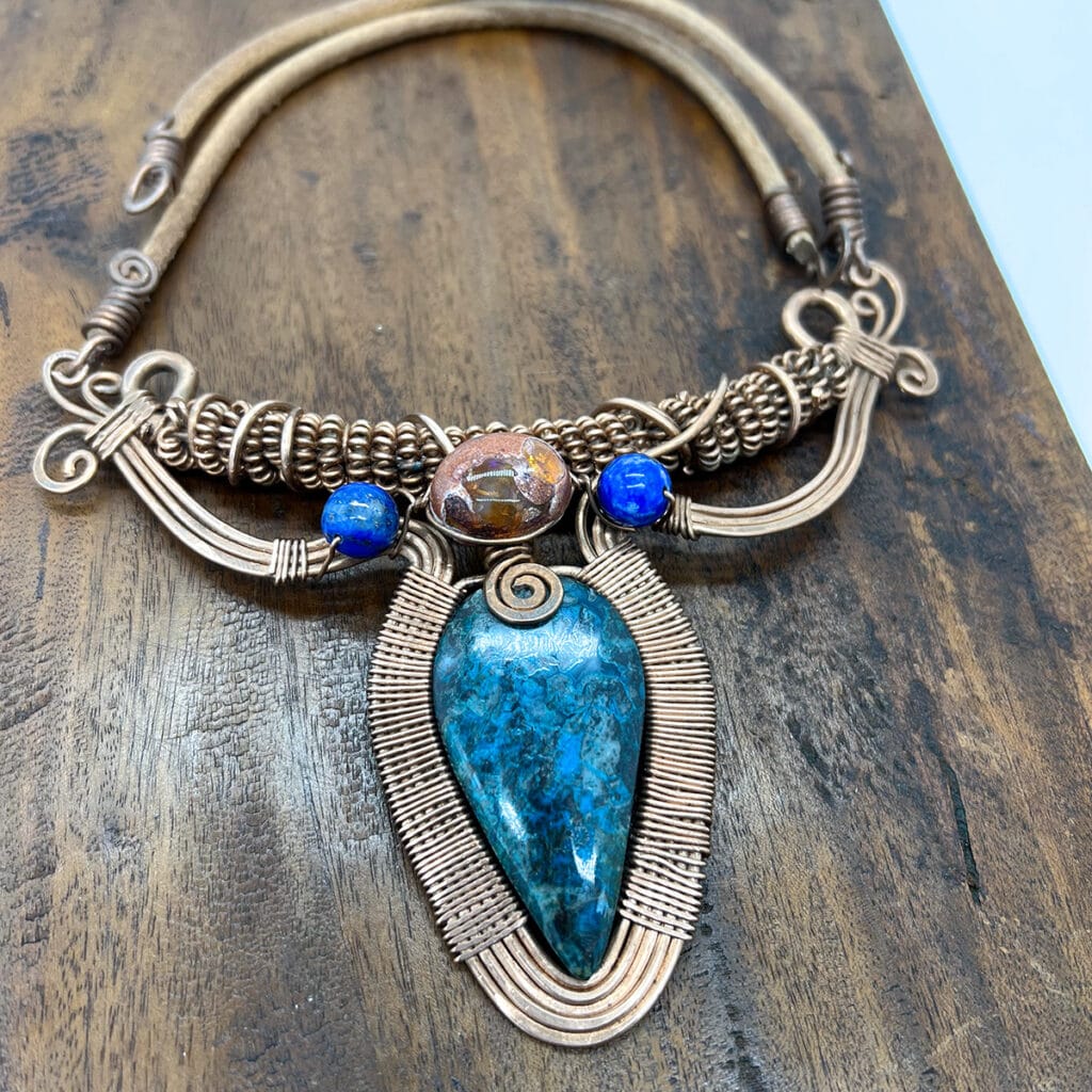 Chrysocolla gemstone with copper pendants