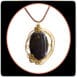 obsidian stone with copper pendants